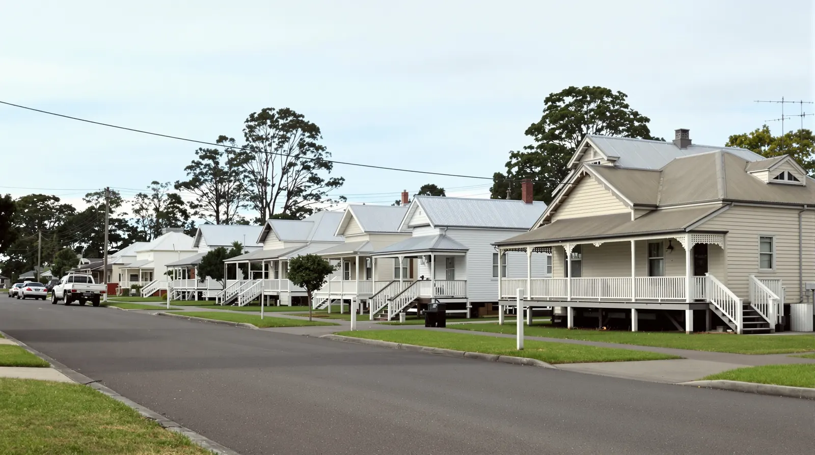 Street of older weatherboard homes on stumps in a Gippsland country town
